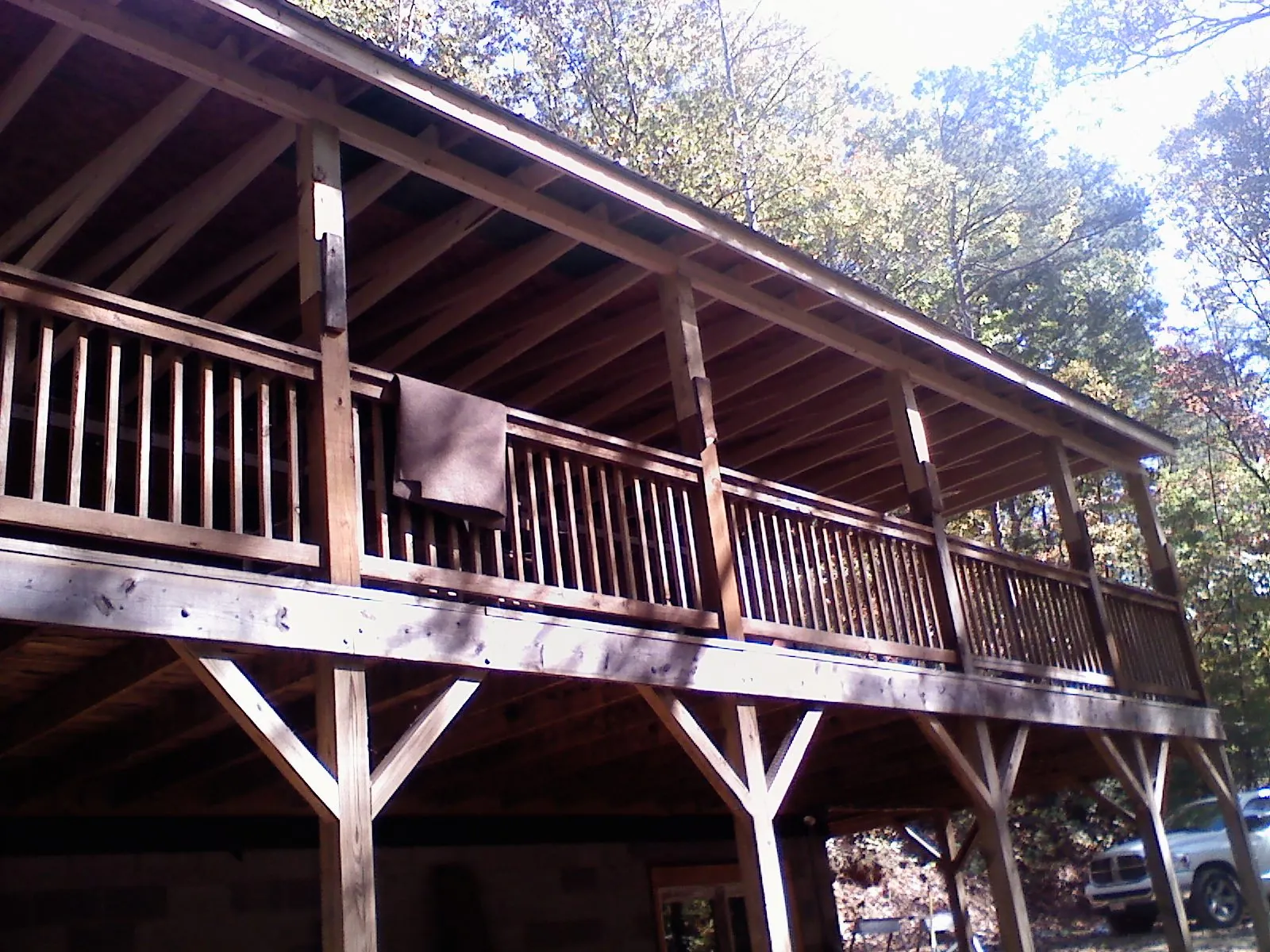 Timber framing under a new elevated porch and deck — Roof Leak Repair in Livermore Falls by Roofing Brothers